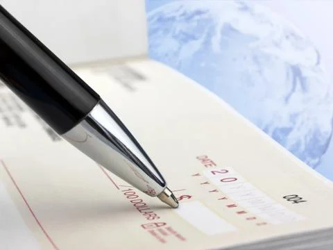 Pen on the Check Stock Photos