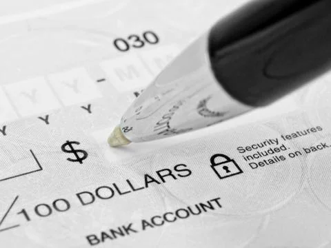 Pen on the Check Stock Photos