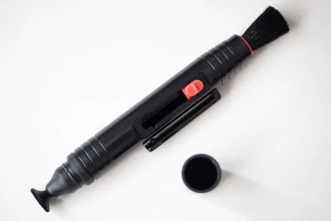 Pen for cleaning the front element of a lens Stock Photos