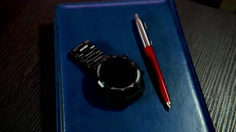 Pen clock and diary Stock Footage