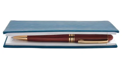 Pen in closed blue notepad on white Stock Photos