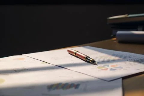 Pen Datapaper and notebook on the table Stock Photos