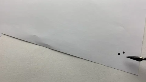 The pen draws a smiley in black ink  on paper. Stock Footage 234426350