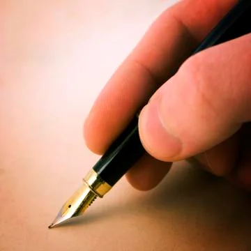 Pen with finger Stock Photos