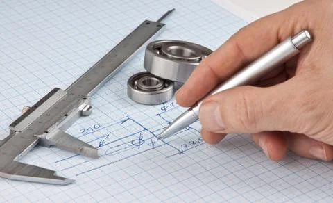 Pen in hand and  technical drawing Fotos de archivo