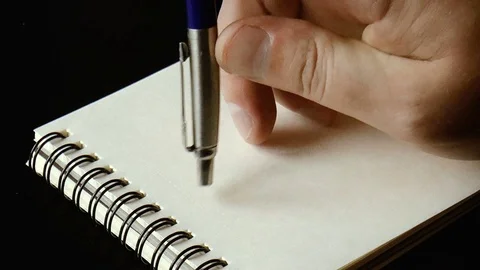 Pen knocks on paper Stock Footage 79409654