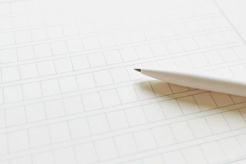 Pen on lined notebook page with copy space, top view Stock Photos