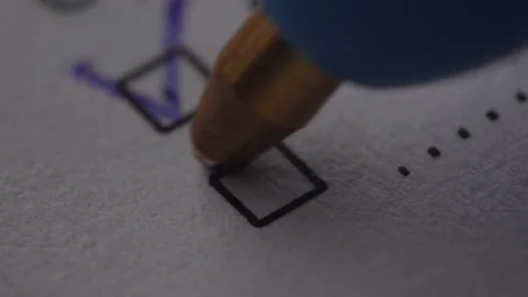 Pen Marking a Checkbox with Red Ink. Stock Footage 261156445