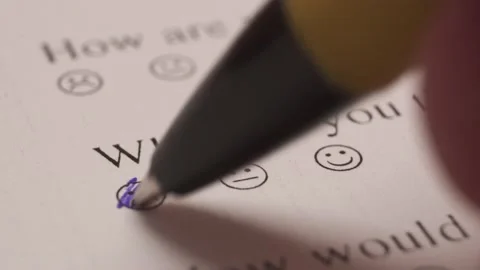 Pen Marking A Happy Smiley Face In The Answer Sheet. Close Up, Selective Stock Footage 172578976