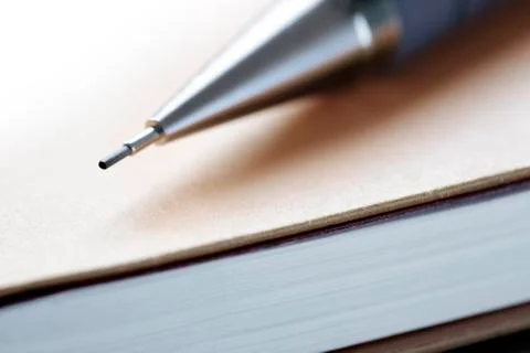 Pen on a note pad Stock Photos