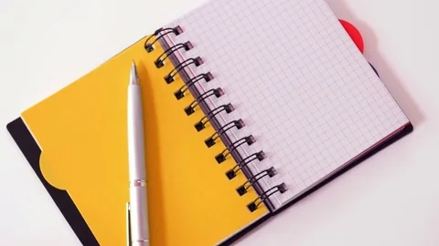 Pen on notebook Stock Footage 70211588