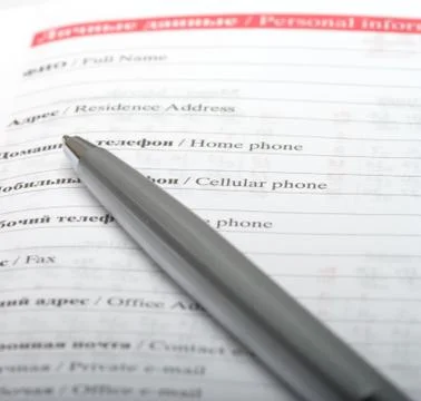 The pen on a notebook Stock Photos