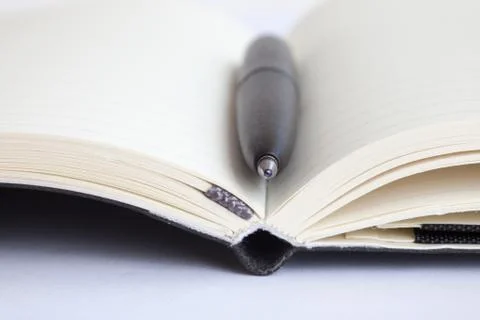 Pen on notebook Stock-Fotos