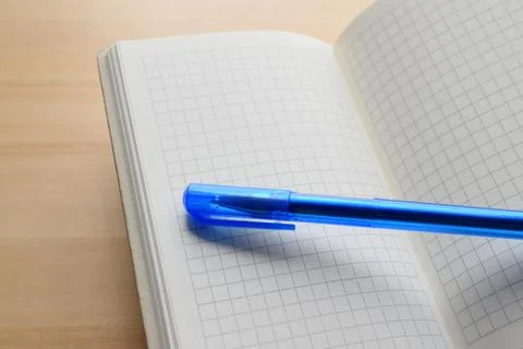 Pen on a notebook Stock Photos