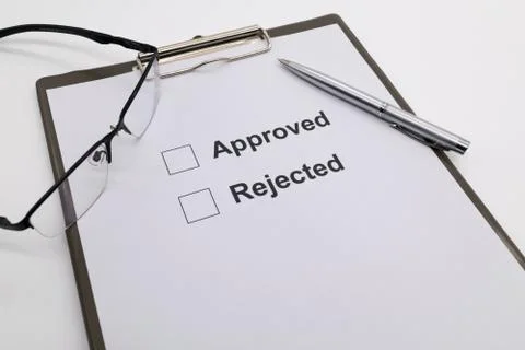Pen over document, select Approved or Rejected. Stock Photos
