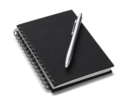 Pen over note book Stock Photos