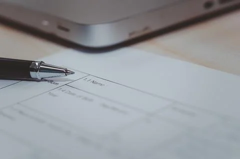 Pen on paper documents, business application. 库存照片