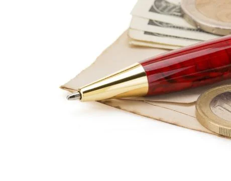 Pen at paper Stock Photos