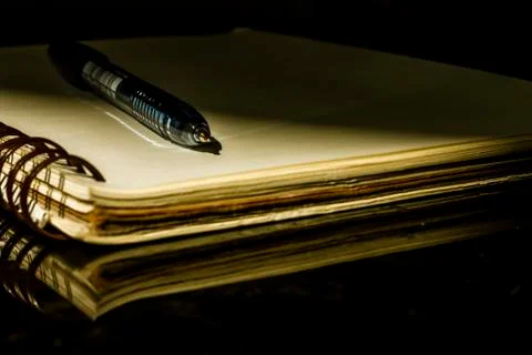 Pen to paper. Stock Photos