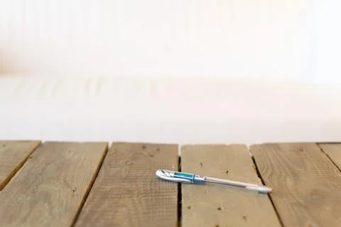 Pen on Rustic Wood Table Stock Photos