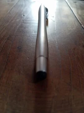 Pen on table closeup pic Stock Photos