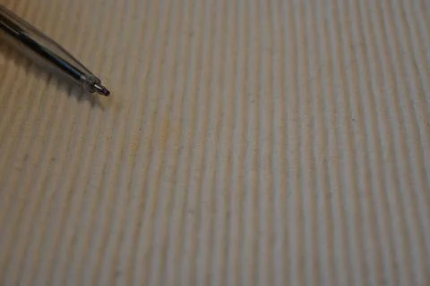 Pen tip over textured paper Foto stock