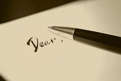 Pen to write a letter dear Stock Photos