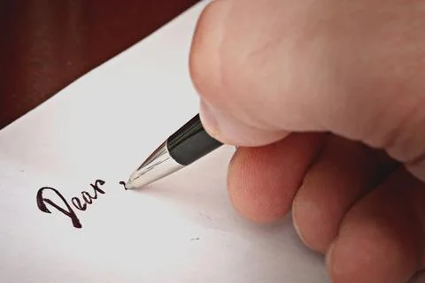 Pen to write a letter dear Stock Photos