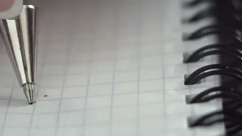 Pen writes a letter on paper. Closeup. Shallow depth of field Stock Footage 69211341