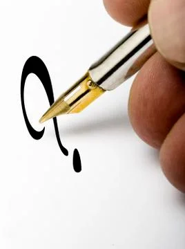 Pen writing a question mark Stock Photos