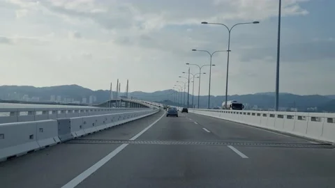 Penang Bridge view from moving car in 8K Stock Footage 234110339