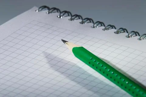 Pencil and notebook Stock Photos