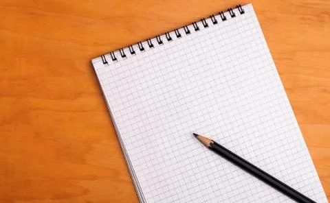 Pencil and notebook Stock Photos