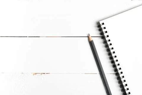 Pencil and notepad Stock Photos