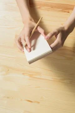 Pencil and notepad Stock Photos