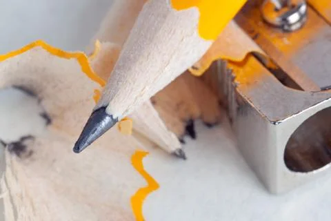 Pencil and sharpener close-up Stock Photos