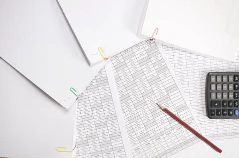 Pencil with calculator and stack paperwork of finance account Stock Photos
