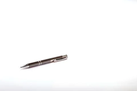 Pencil case and pen on a light milky background , for design solutions Stock Photos