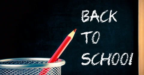 Pencil container and blackboard frame with written back to school Stock Footage 67843511