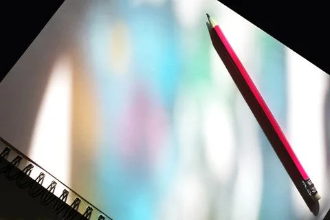 Pencil on a drawing block with light effects Foto stock