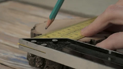 Pencil drawing a line on the stump Stock Footage 103595917
