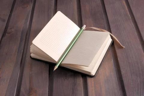 Pencil enclosed in a notebook Stock-Fotos