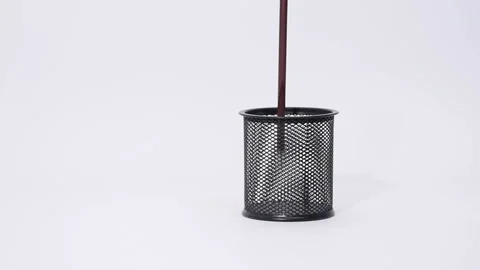 Pencil falling in pen holder Stock Footage 151922668