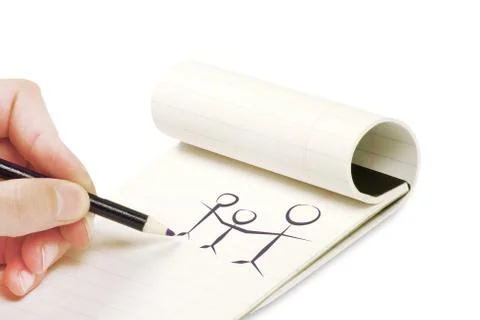 Pencil in hand writing on the notebook Stock Photos