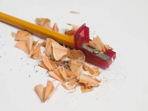 Pencil inserted into the sharpener Stock Photos