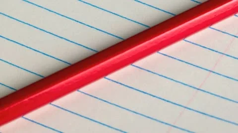 Pencil on a lined pad of paper Stock Footage 21305555