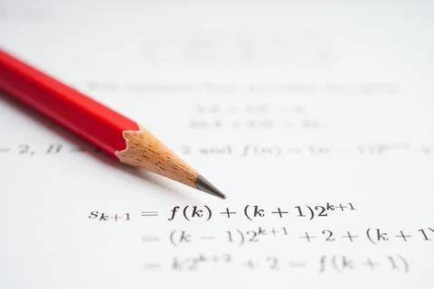 Pencil on mathematic formula exercise test paper in education school. Stock Photos