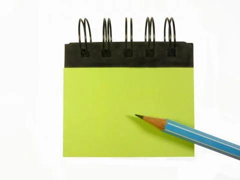 Pencil on notebook isolated on white background Stock Photos