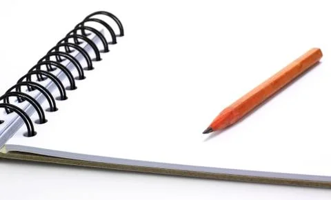 Pencil on the notebook isolated on white Stock Photos