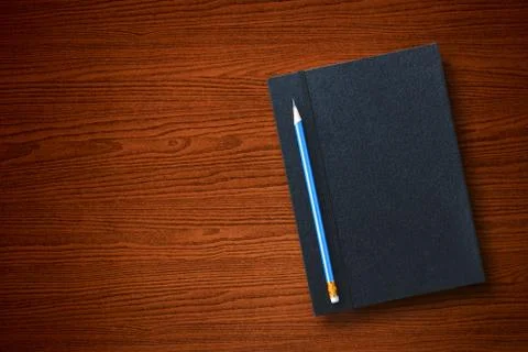 Pencil with notebook Stock Photos